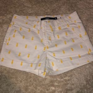 Shut jean shorts with pineapples on them